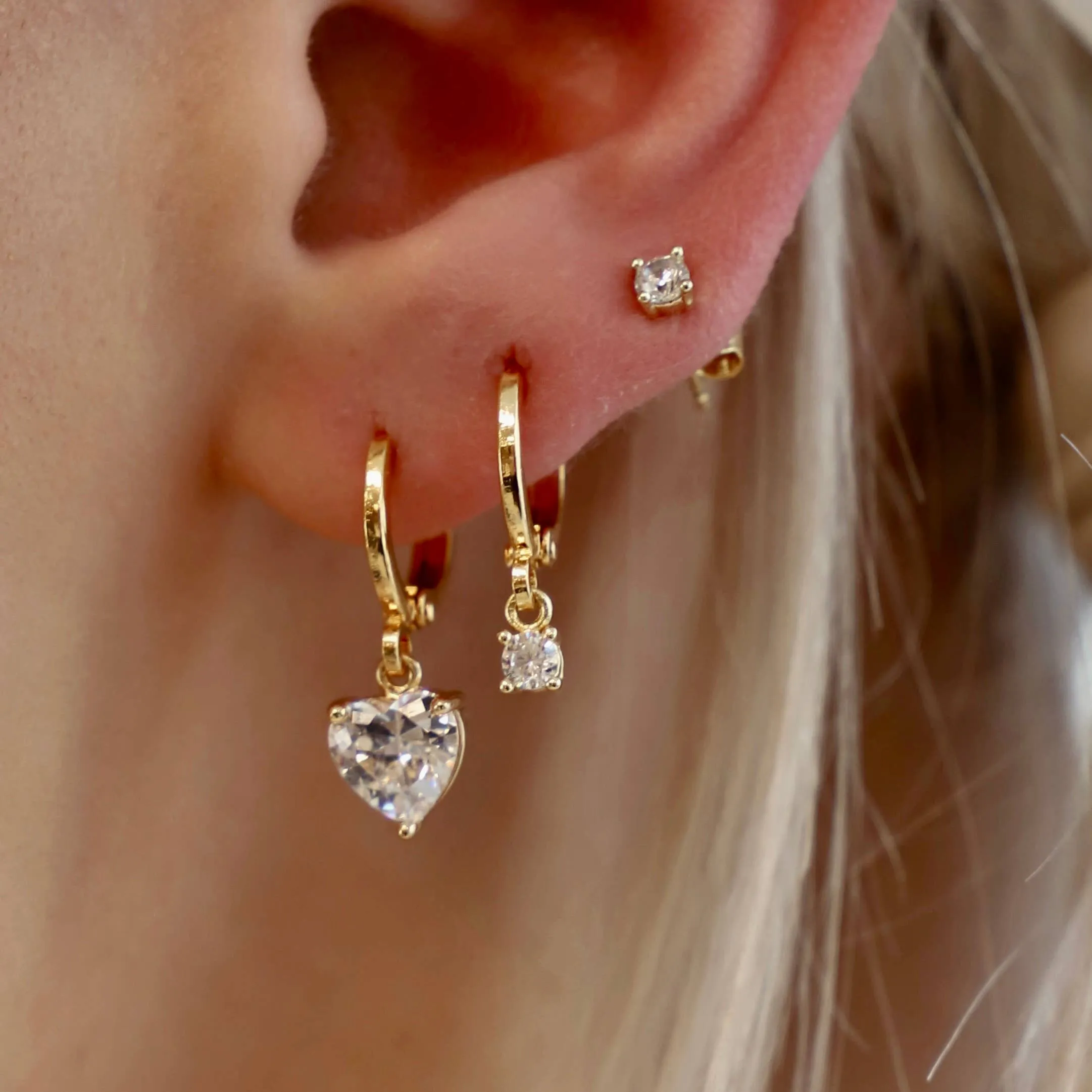 E1545G Gold Earrings-CZ Heart Huggies