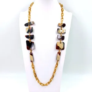 Flat rounded square resin shapes on long resin chain necklace